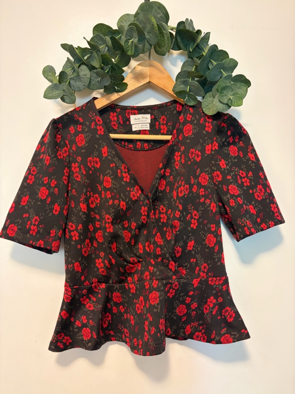 Anthropologie Black Short-Sleeve Peplum Top with Red Floral Print